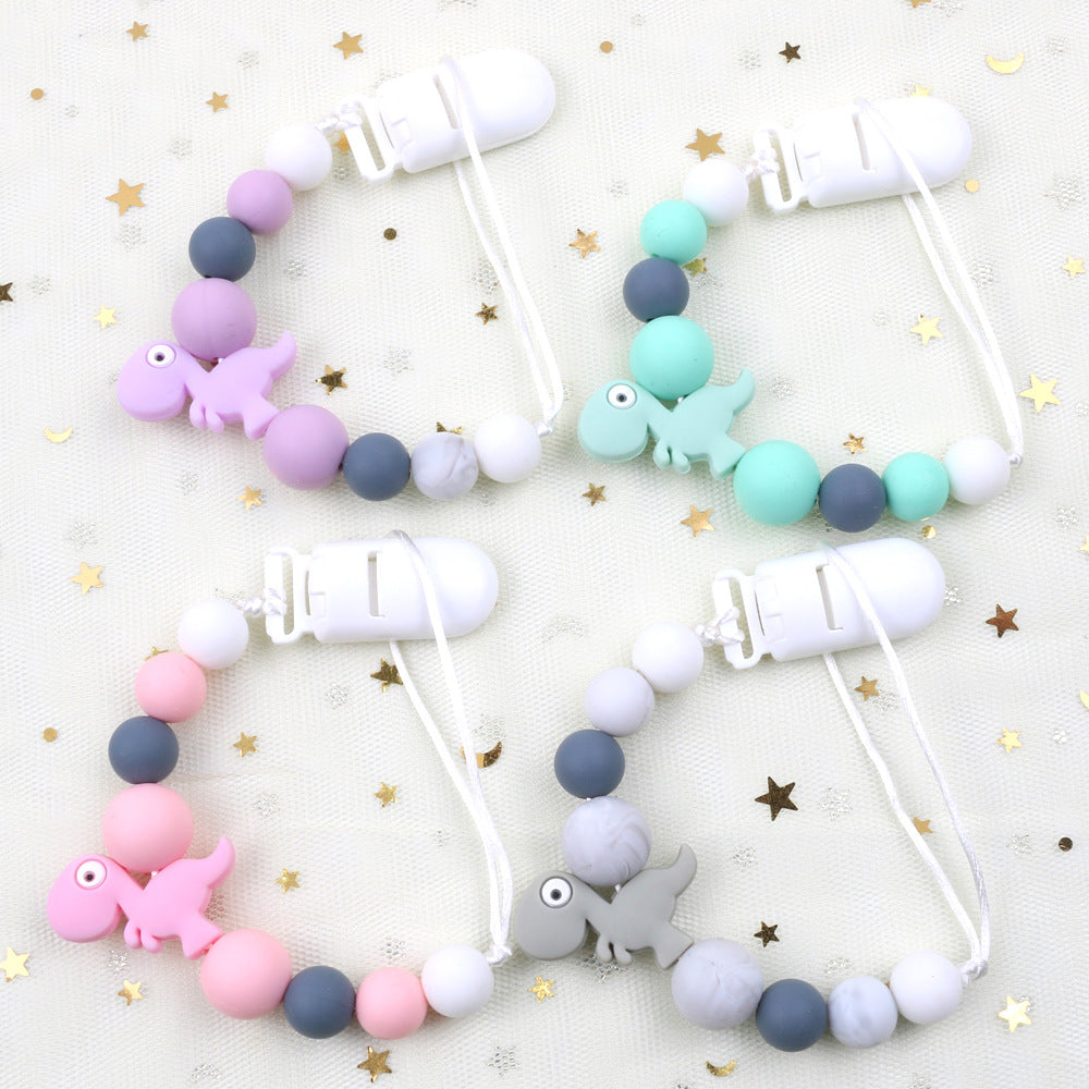 New baby pacifier chain clip teeth glue toy anti-drop chain silicone dinosaur pacifier chain baby products