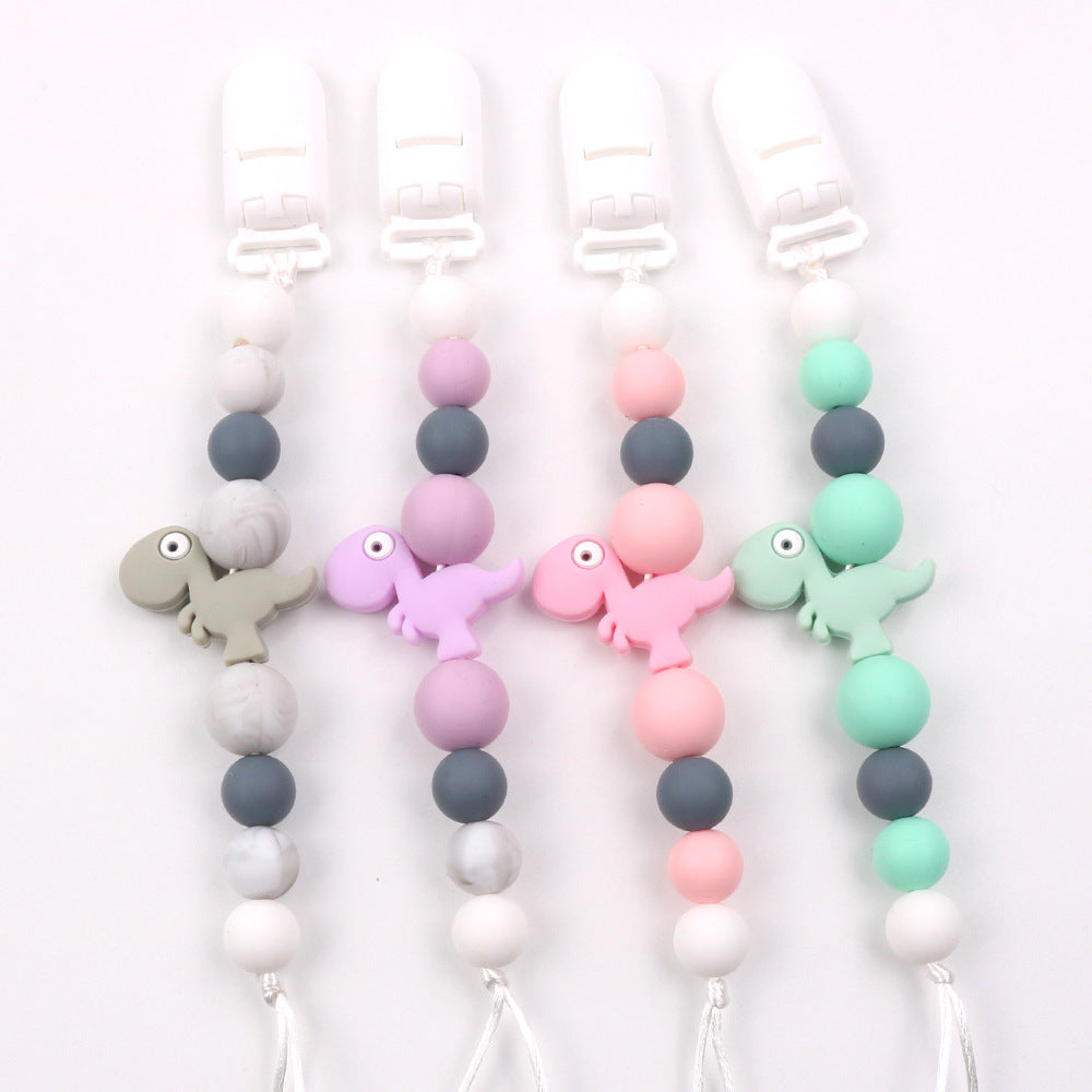 New baby pacifier chain clip teeth glue toy anti-drop chain silicone dinosaur pacifier chain baby products